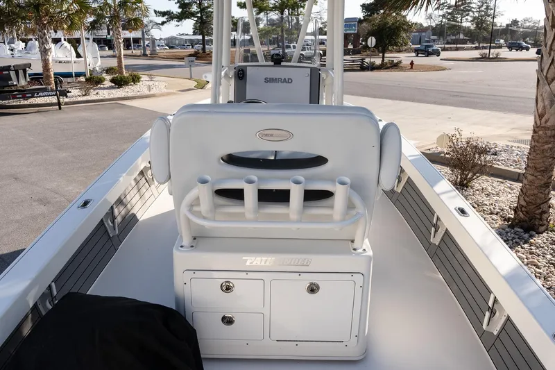 Slide: The Image of 2024 Pathfinder 2500 Hybrid boat interior with rod holders and storage compartments. - 8