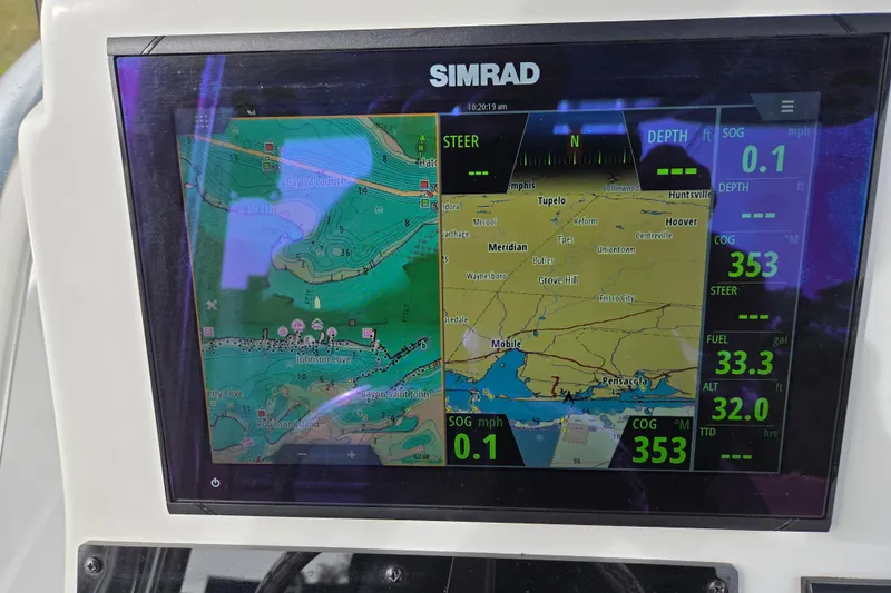Slide: The Image of Simrad navigation display on 2022 Aquasport 244 Bay boat, showing maps and data. - 25