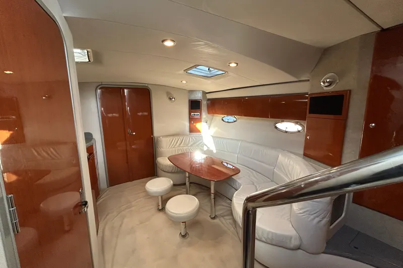 Slide: The Image of 2005 Formula 40 Performance Cruiser interior with elegant seating and wooden finishes. - 8