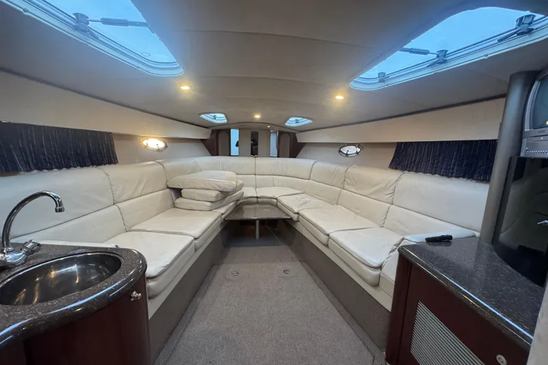 Slide: The Image of Luxurious interior of 2003 Formula 400 Super Sport yacht with plush seating and modern amenities. - 8
