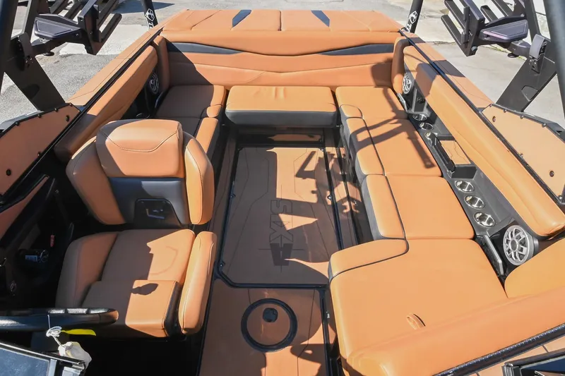 Slide: The Image of 2023 Axis A225 boat interior with tan leather seating and modern design. - 18