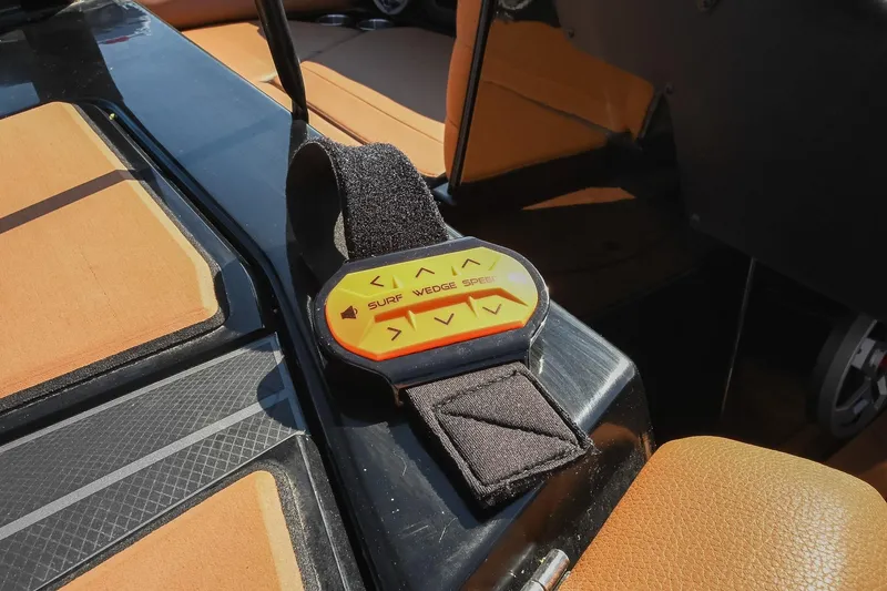 Slide: The Image of 2023 Axis A225 boat control panel with surf, wedge, and speed settings. - 29