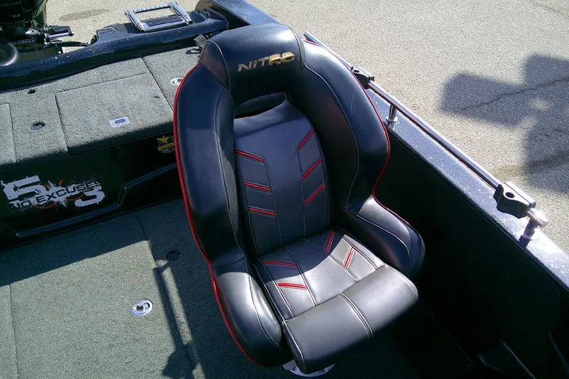 Slide: The Image of 2018 Nitro ZV18 boat seat with black and red design. - 14
