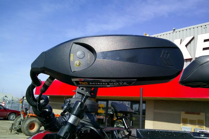 Slide: The Image of Minn Kota motor on 2018 Nitro ZV18 boat, outdoor dealership setting. - 7