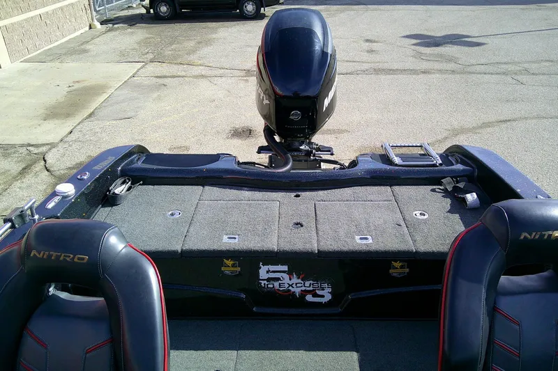 Slide: The Image of 2018 Nitro ZV18 boat with Mercury engine, featuring spacious seating and storage compartments. - 9