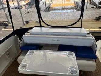 Slide: The Image of Interior of a 2005 Sea Ray 340 Sundancer with table and seating area. - 3