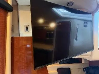 Slide: The Image of Interior of a 2005 Sea Ray 340 Sundancer with flat-screen TV. - 7