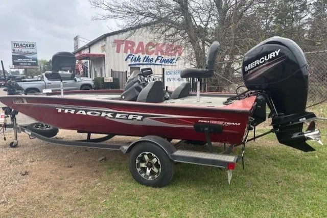 The Image of 2019 Tracker Pro Team 195 TXW Tournament Edition boat with Mercury engine on trailer. - 0