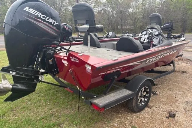 Slide: The Image of 2019 Tracker Pro Team 195 TXW Tournament Edition boat with Mercury engine on trailer. - 4