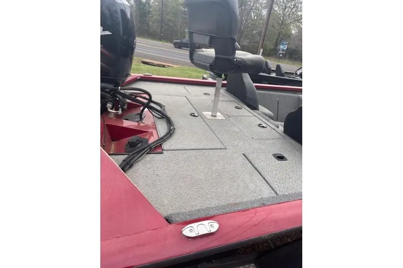 Slide: The Image of 2019 Tracker Pro Team 195 TXW Tournament Edition boat deck with seating and storage compartments. - 8