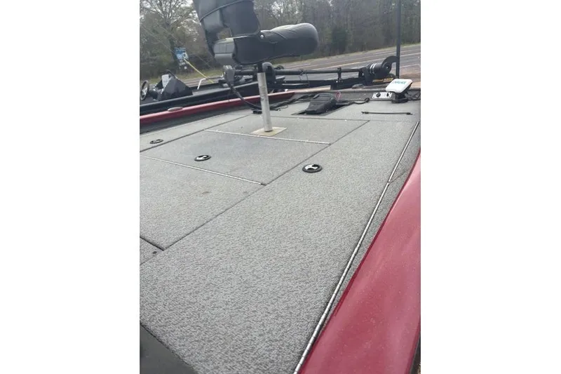 Slide: The Image of 2019 Tracker Pro Team 195 TXW Tournament Edition boat deck with seating and storage compartments. - 9