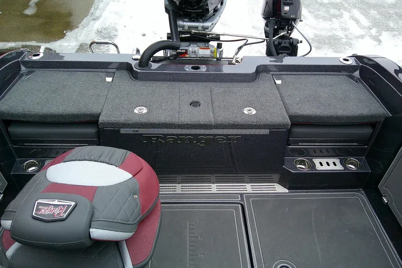 Slide: The Image of 2026 Ranger 620xFS Pro boat interior with seating and storage compartments. - 10