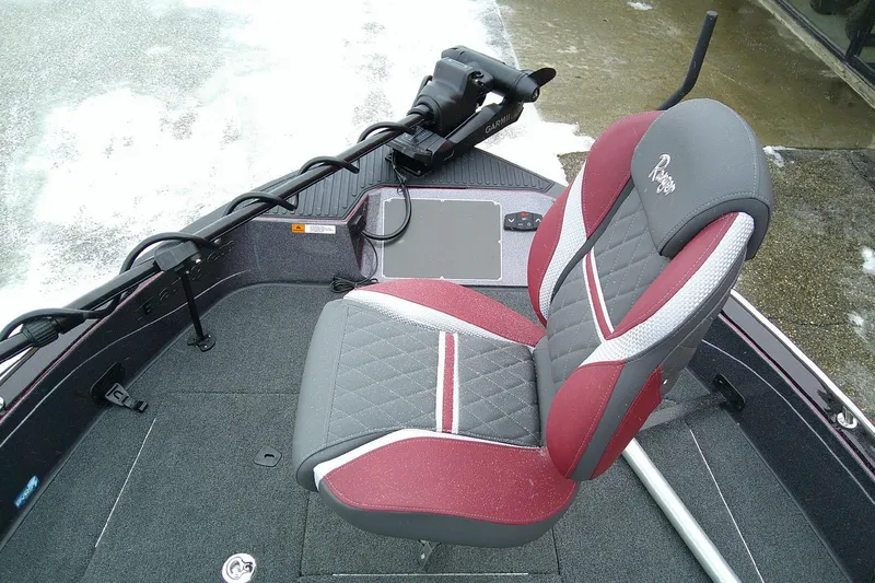 Slide: The Image of 2026 Ranger 620xFS Pro boat seat with red and gray upholstery, featuring a Garmin device. - 11