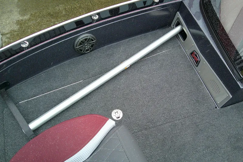 Slide: The Image of 2026 Ranger 620xFS Pro boat interior with speaker and carpeted floor. - 15