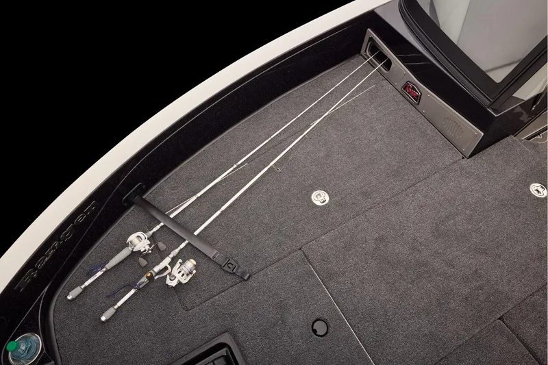 Slide: The Image of Manufacturer Provided Image: 2026 Ranger 620xFS Pro boat deck with fishing rods and storage compartments. - 39