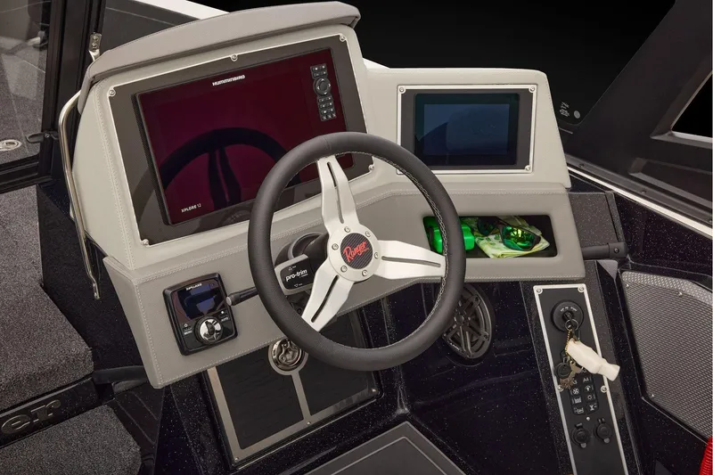 Slide: The Image of Manufacturer Provided Image: 2026 Ranger 620xFS Pro boat dashboard with steering wheel and electronic displays. - 55