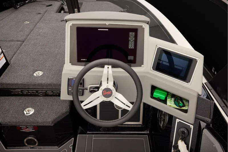 Slide: The Image of Manufacturer Provided Image: 2026 Ranger 620xFS Pro boat dashboard with steering wheel and electronic displays. - 56