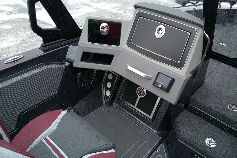 Slide: The Image of 2026 Ranger 620xFS Pro boat interior with modern dashboard and seating. - 6