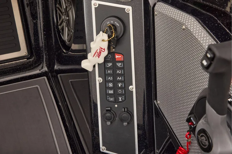 Slide: The Image of Manufacturer Provided Image: Control panel of 2026 Ranger 620xFS Pro boat with key and switches. - 60