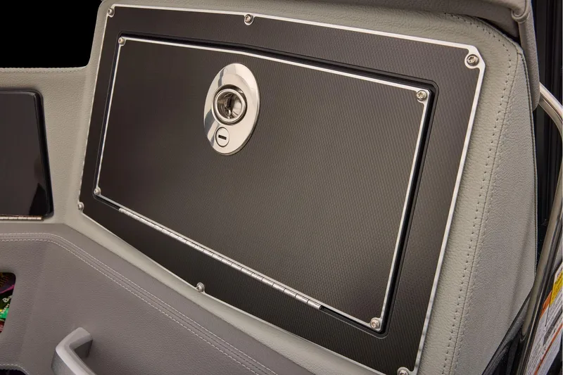 Slide: The Image of Manufacturer Provided Image: 2026 Ranger 620xFS Pro boat dashboard with sleek black panel and secure lock. - 66