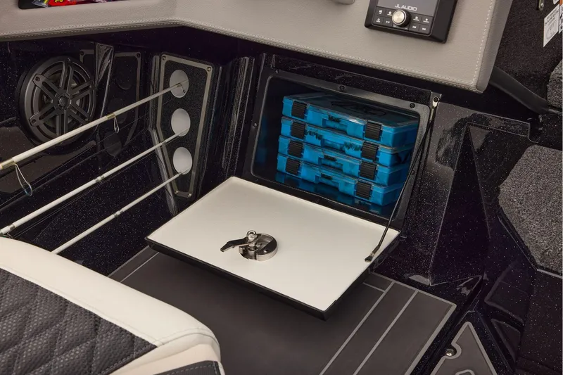 Slide: The Image of Manufacturer Provided Image: Interior of 2026 Ranger 620xFS Pro boat with storage compartments and fishing rod holders. - 67