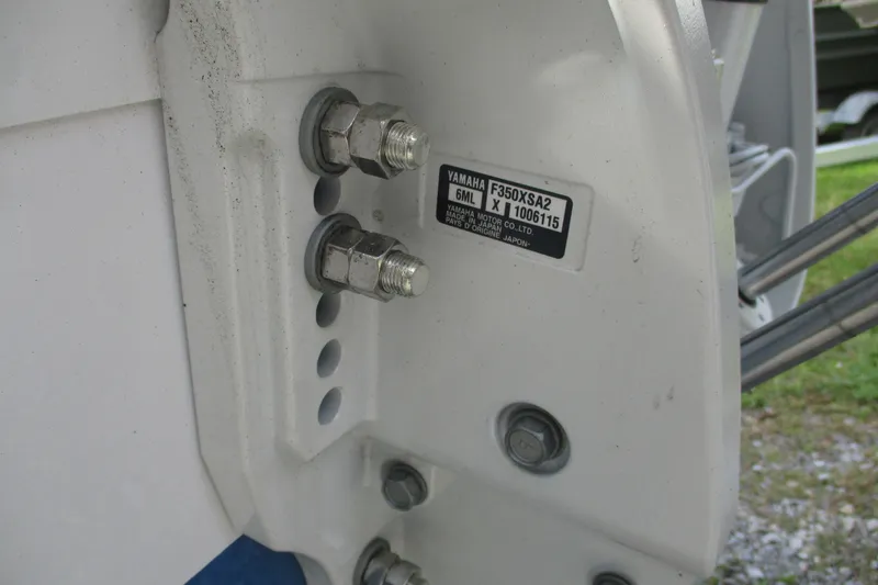 Slide: The Image of Close-up of Yamaha motor mount on 2026 Sportsman Open 302 Center Console boat. - 22