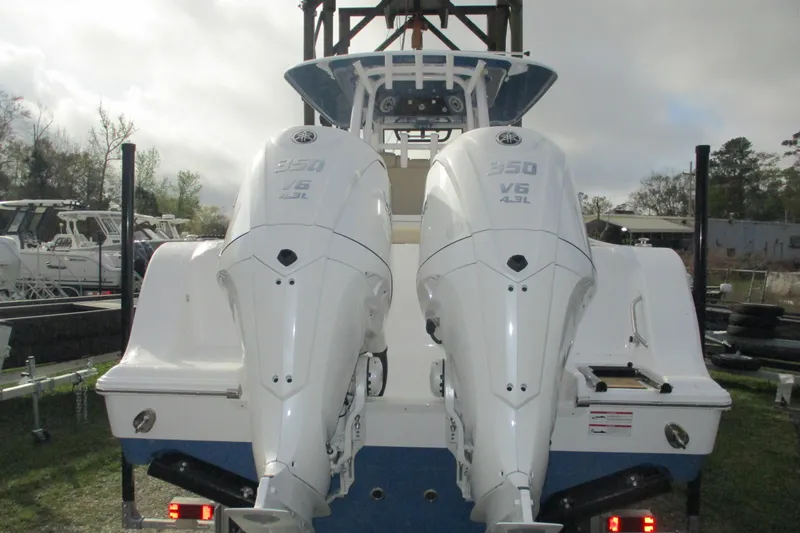 Slide: The Image of 2026 Sportsman Open 302 Center Console with dual 350 V6 engines, rear view. - 4