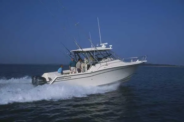 Slide: The Image of 2005 Grady-White Express 330 boat on the water. - 0