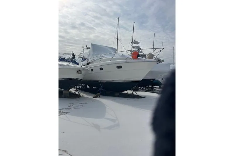 Slide: The Image of 2001 Viking Princess yacht on snowy ground, urgent sale. - 15