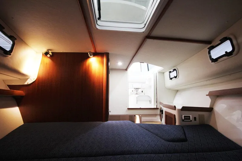 Slide: The Image of Manufacturer Provided Image: 2026 NorthCoast 315 HT cabin interior with modern design and natural lighting. - 15