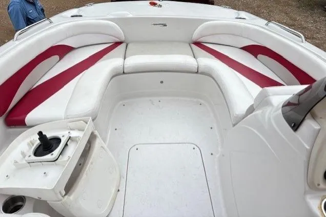 Slide: The Image of 2011 Glastron DS 205 boat interior with white and red seating arrangement. - 6