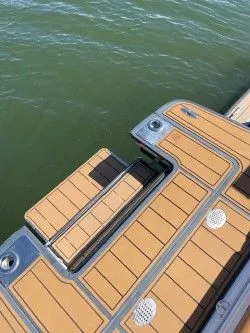 Slide: The Image of Chaparral 287 SSX 2022 boat deck with wooden flooring. - 10