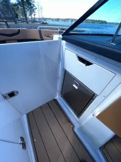 Slide: The Image of 2022 Chaparral 287 SSX boat interior with lake view. - 9