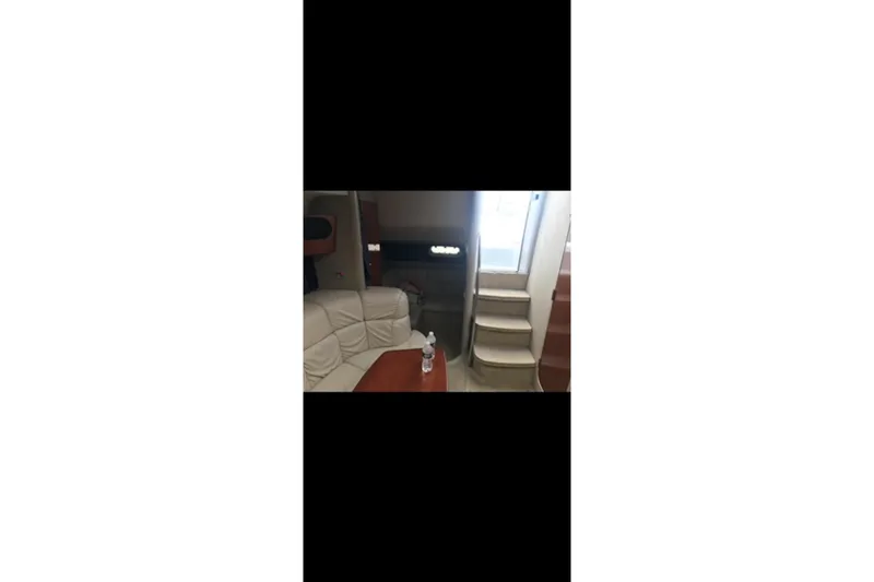 Slide: The Image of Interior of 2004 Formula 37 Performance Cruiser with seating and stairs. - 9