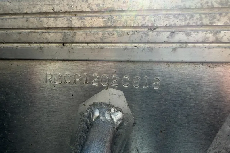 Slide: The Image of 2016 Raider 182 Pro Sport hull identification number on metal surface. - 7