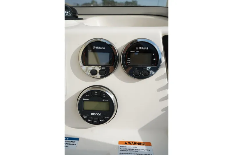 Slide: The Image of Dashboard of 2020 Robalo 226 Cayman with Yamaha gauges and Clarion audio system. - 13