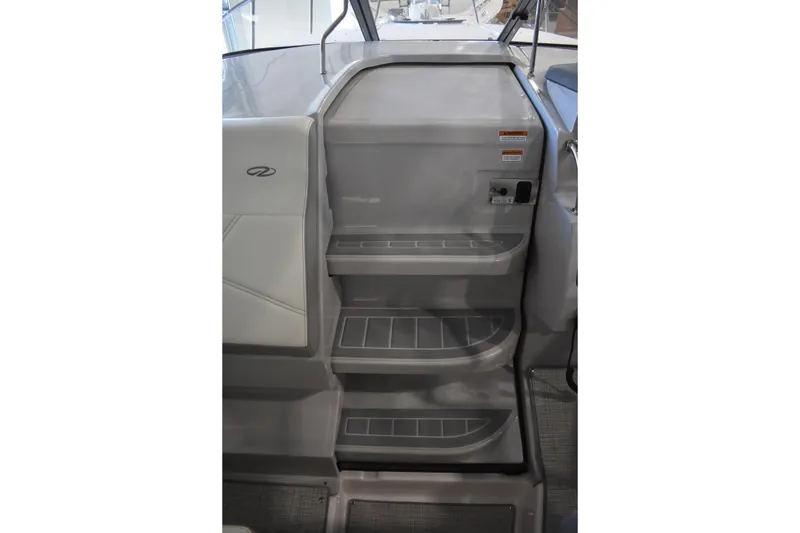 Slide: The Image of Interior steps of 2026 Regal 26 XO boat, featuring sleek design and modern materials. - 24
