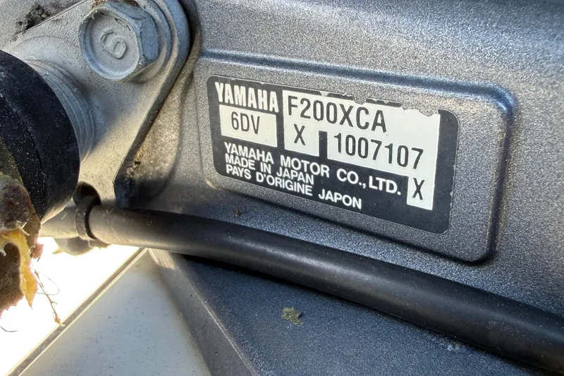 Slide: The Image of Yamaha F200XCA engine label on 2018 Sea Hunt Gamefish 27 boat, made in Japan. - 19