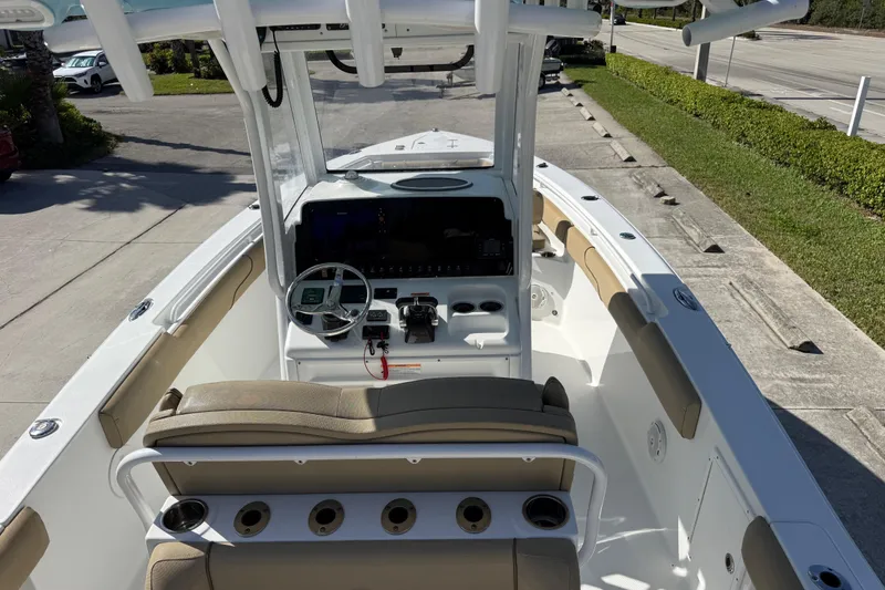 Slide: The Image of 2018 Sea Hunt Gamefish 27 boat interior with helm, seating, and console. - 26