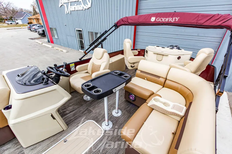 Slide: The Image of 2023 Godfrey Sweetwater 2286 FS pontoon boat with luxurious seating and modern helm. - 19