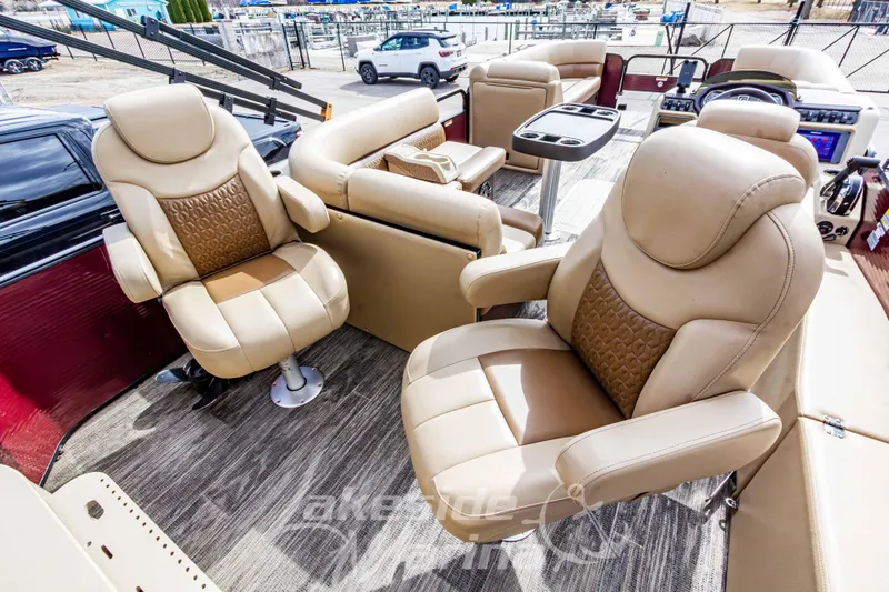Slide: The Image of Luxurious seating on 2023 Godfrey Sweetwater 2286 FS pontoon boat interior. - 26