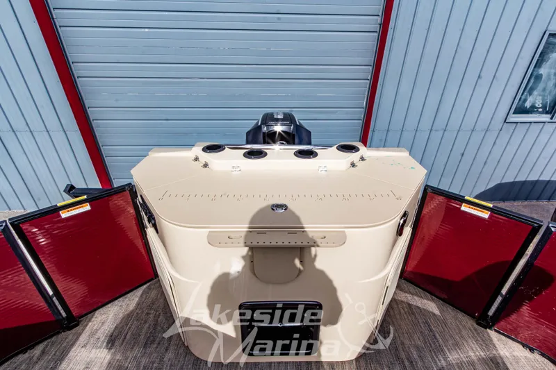 Slide: The Image of 2023 Godfrey Sweetwater 2286 FS boat stern view with engine, Lakeside Marina logo. - 27