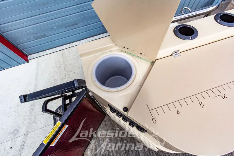 Slide: The Image of 2023 Godfrey Sweetwater 2286 FS boat with integrated storage and measuring features. - 30