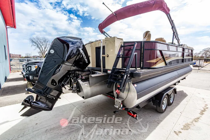 Slide: The Image of 2023 Godfrey Sweetwater 2286 FS pontoon boat with Mercury outboard motor on trailer. - 4