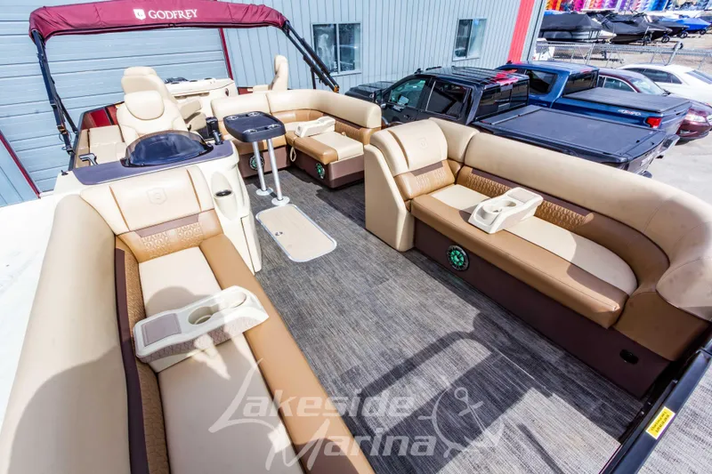 Slide: The Image of 2023 Godfrey Sweetwater 2286 FS pontoon boat with spacious seating and modern amenities. - 9