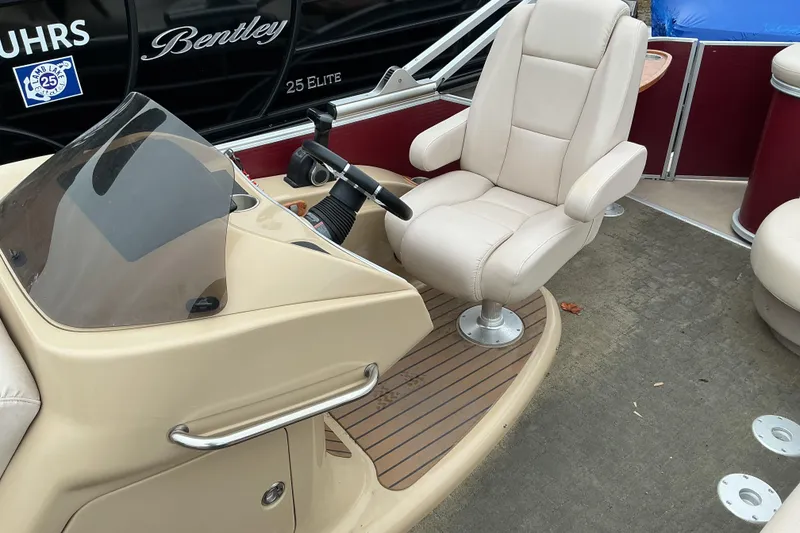 Slide: The Image of Captain's chair and helm of 2013 Godfrey Sanpan SP2200 BC3 pontoon boat. - 11