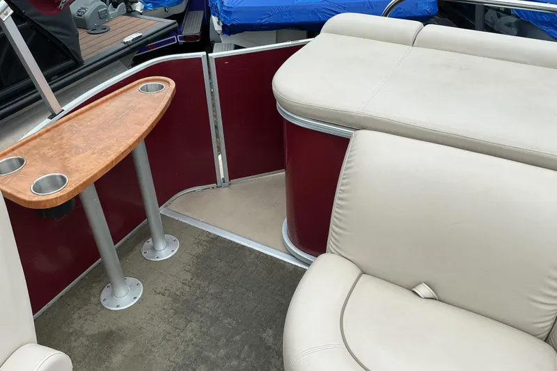 Slide: The Image of 2013 Godfrey Sanpan SP2200 BC3 interior with beige seating and wooden table. - 15