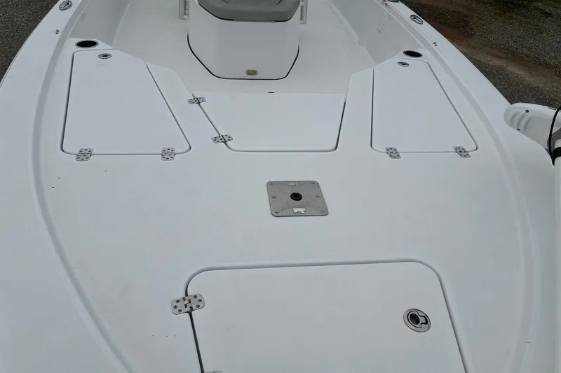 Slide: The Image of 2020 Sportsman Tournament 214 SBX Bay Boat deck with storage compartments. - 10