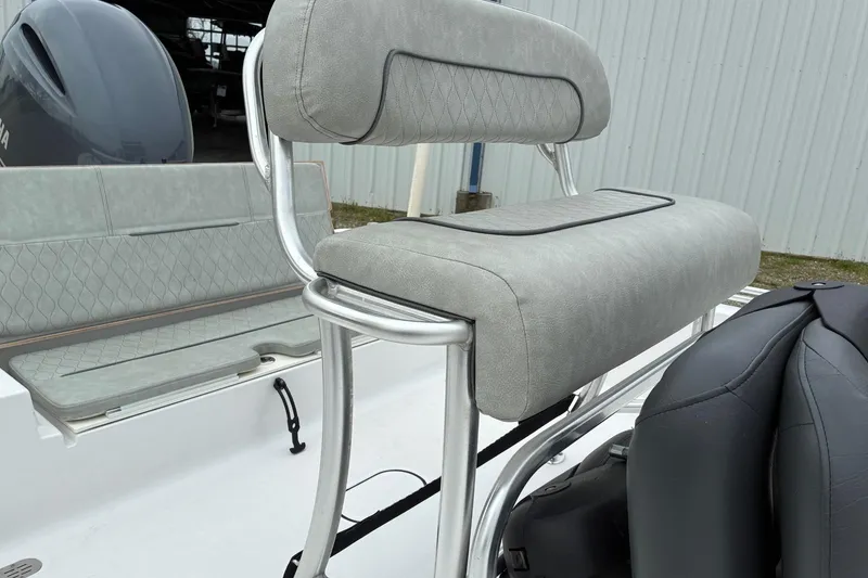 Slide: The Image of 2020 Sportsman Tournament 214 SBX Bay Boat with cushioned seating and sleek design. - 6