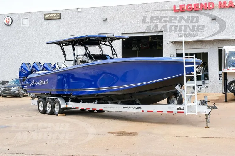 The Image of 2023 Nor-Tech 390 Sport Center Console boat on trailer at Legend Marine Group. - 2